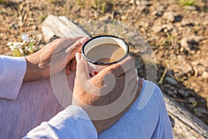 Tasty coffee consumed with delight in nature by adult woman