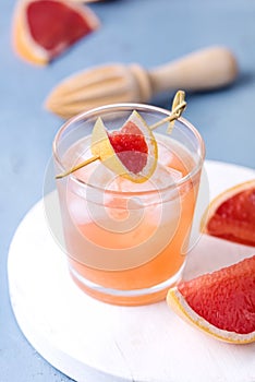 Tasty Cold Wet Drinking Glass With Fresh Grapefruit Summer Alcohol Cocktail Grapefruit Juice Ice Blue Background Vertical Above