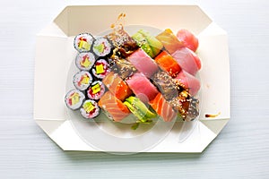Tasty Colorful assorted Set of different type Sushi. Dinner in Japanese style. Healthy food concept. Filadelfia and Maki sushi