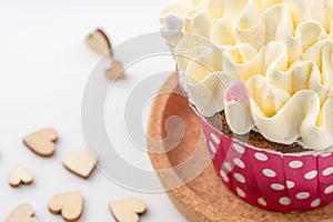 Tasty colorful cupcake isolated on white background.