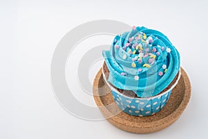 Tasty colorful cupcake isolated on white background.