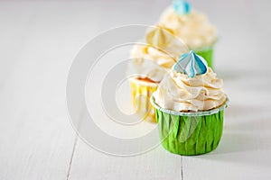 Tasty colorful cupcake on table. Copy space for Text.