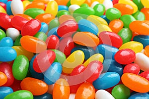 Tasty colorful jelly beans as background