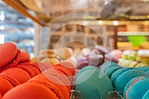 Tasty colourful red, purple and blue macaroons