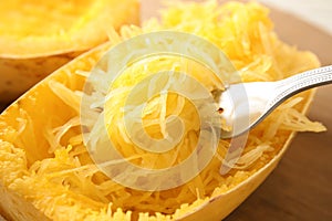 Tasty cooked spaghetti squash and fork