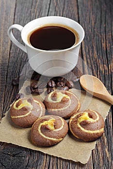 Tasty cookies with coffee