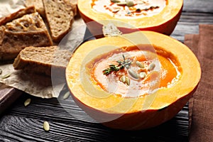 Tasty cream soup served in pumpkin