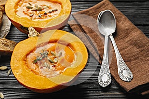 Tasty cream soup served in pumpkin