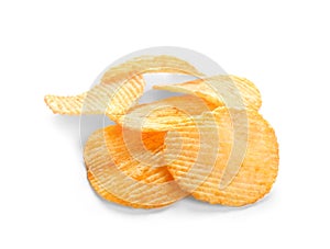 Tasty crispy potato chips on white background