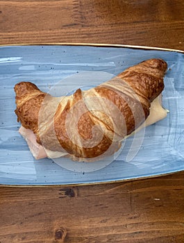 Tasty Croissant With Salami And Cheese