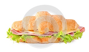 Tasty croissant sandwich with ham isolated on white