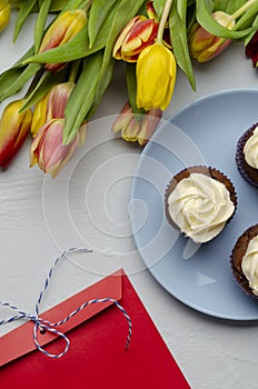 Tasty cupcakes and tulip. Mother`s day celebration