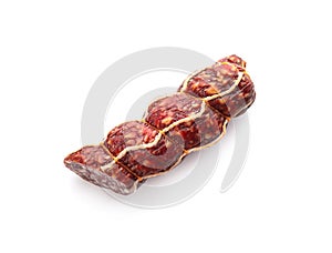 Tasty cut salami on white background. Meat product