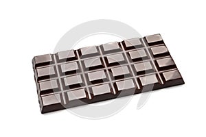 Tasty dark chocolate bar on white