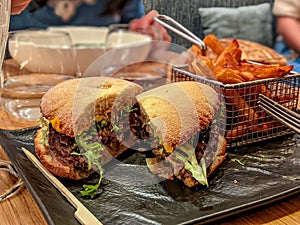 Tasty and delicious juicy beef burger cut in half