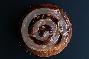 Tasty Dessert , Stcky Bun on Black Background