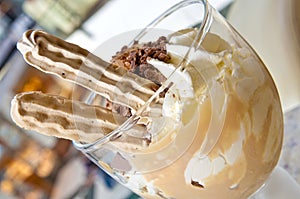 Tasty dessert - vanilla and caramel ice cream sundae