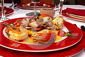 Tasty dish from sea products at restaurant photo