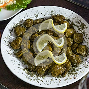 Tasty dolma, meat meal lemon on it