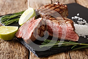 Tasty fillet mignon beef steak close-up on board. horizontal