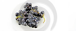 Tasty fresh black grape in a bowl