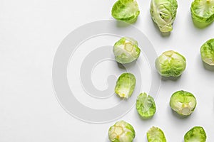 Tasty fresh Brussels sprouts on white background