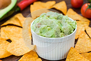 Tasty fresh guacamole with nachos