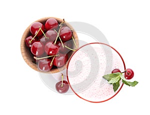 Tasty fresh milk shake with cherries on white background, top view