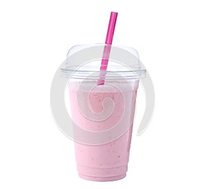 Tasty fresh milk shake in plastic cup on background