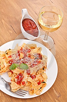 Tasty fresh pasta with tomato sauce