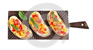 Tasty fresh tomato bruschettas on white , top view