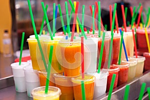 Tasty fruit smoothies at the Boqueria market in Barcelona.Fresh Natural Juice For Sale In Spanish Market