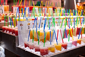 Tasty fruit smoothies at the Boqueria market in Barcelona.Fresh Natural Juice For Sale In Spanish Market