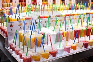 Tasty fruit smoothies at the Boqueria market in Barcelona.Fresh Natural Juice For Sale In Spanish Market