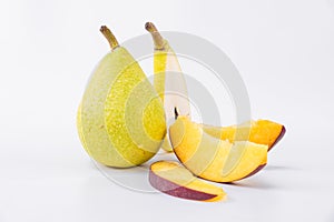 Tasty fruit snack - Fresh and sweet pears with flat peach - Pear slices and flat peach slices