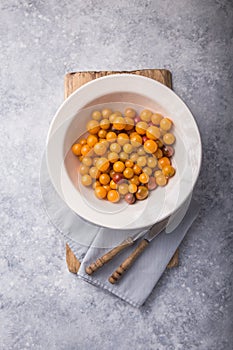 Tasty greek salad with colorful yellow cherry tomatoes