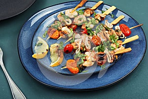 Tasty grilled seafood kebabs, shellfish