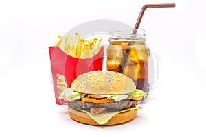 Tasty hamburger, French fries and cola isolated on white background.