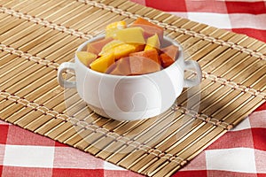 Tasty and healthy fruit; Bowl with chopped fruits photo