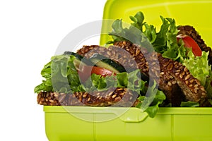 Tasty Healthy Vegetarian Vegan Sandwich in Lunch Box on White Ta