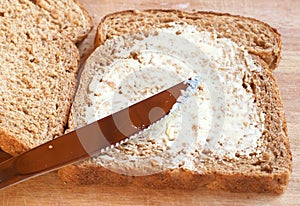 Tasty healthy wholewheat bread with butter