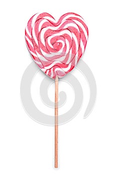 Tasty heart-shaped lollipop on white background