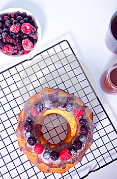 Tasty homemade vanilla bunt cake with berries