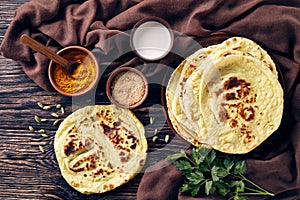 Tasty hot freshly baked indian flatbread - naan