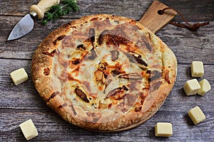 Tasty hot italian focaccia pizza with porcini mushroom