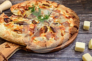 Tasty hot italian focaccia pizza with porcini mushroom