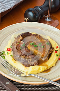 Tasty hot Osso Bucco with mashed potatoes