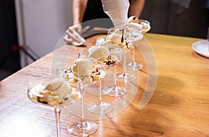 Tasty ice cream dessert made from chocolate and vanilla in glass bowl