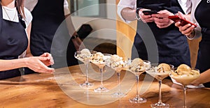 Tasty ice cream dessert made from chocolate and vanilla in glass bowl