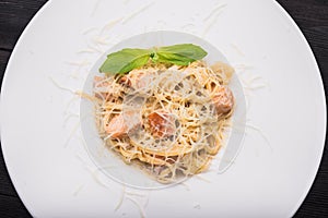 Tasty italian pasta with basil